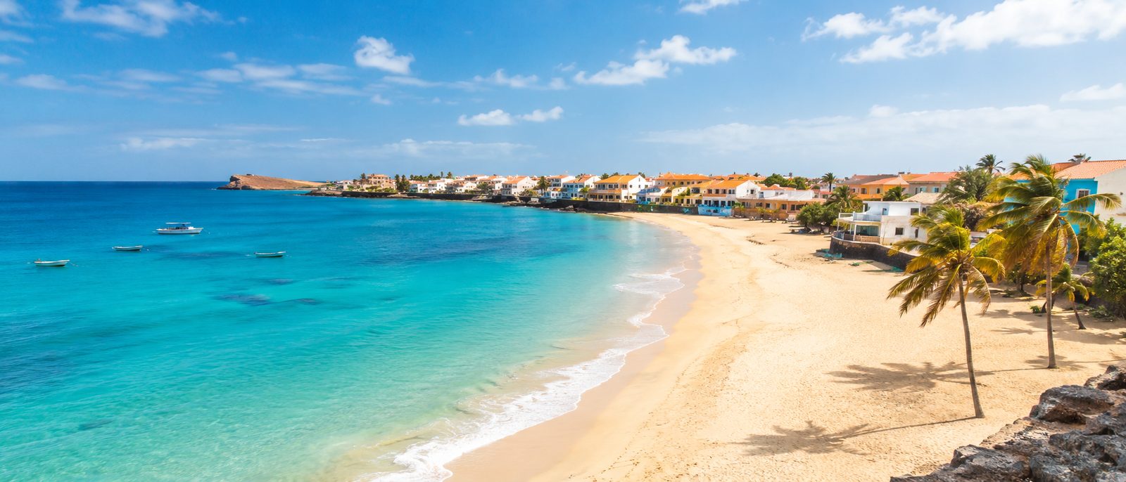 Turquoise bay, golden beach and colourful coastal village in Cape Verde
