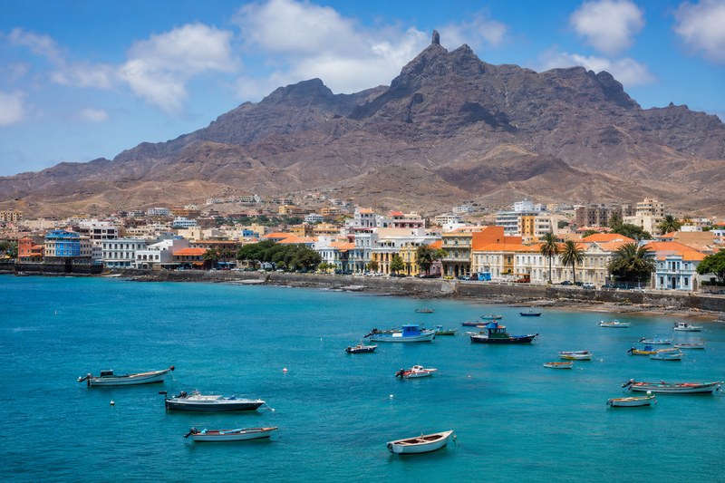 Colourful waterfront buildings and fishing boats in Mindelo bay on São Vicente, Cape Verde